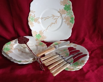 Vintage set, cake plates, cutlery and cake tongs.