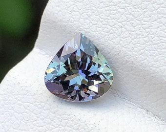 Natural Unheated Tanzanite , Rarest Mermaid Colour , 1.44 Ct Weight , 7.27 × 7.35 MM Size , Eye Clean ( Not loupe clean )