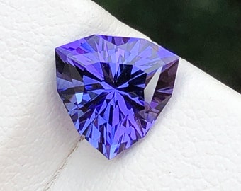 Natural Tanzanite, Special Trillion Cut , Customise new cutting , 1.70 ct weight , size is near to 7.76 × 7.82 MM, Eye Clean