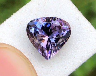 Natural Unheated Pleochroic Tanzanite, Rare Mermaid Colour ( It look black tanzanite In normally ), 2.57 Ct Weight , 8.65 × 8.88 MM Size