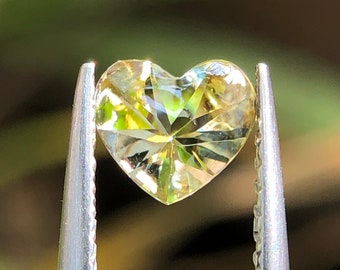 Natural Unheated Tanzanite, Yellow Colour , Buff Top Cut Heart shape , 0.58 Ct Weight , 5.25 × 5.87 MM Size , Loupe Clean