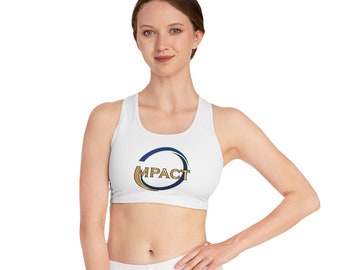 May include: White sports bra with a blue and gold logo that says "MPACT" in a circle.