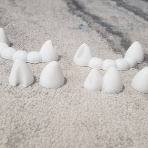 Misprinted fursuit teeth