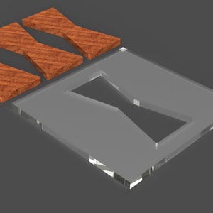 May include: A clear, rectangular acrylic piece with a bowtie-shaped cutout, accompanied by three wooden bowtie-shaped pieces. The wood has a visible grain pattern. The objects are set against a dark gray background.