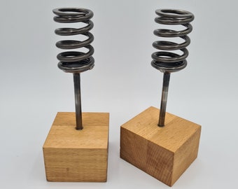 Upcycled candlestick holders, car engine valves and valvesprings set into a solidwood base. Handmade candle holder, fireplace centrepiece.