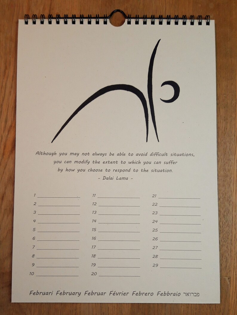May include: A calendar with a black and white illustration of a person doing yoga. The calendar is for February and has the quote "Although you may not always be able to avoid difficult situations, you can modify the extent to which you can suffer by how you choose to respond to the situation. - Dalai Lama -" printed on it.