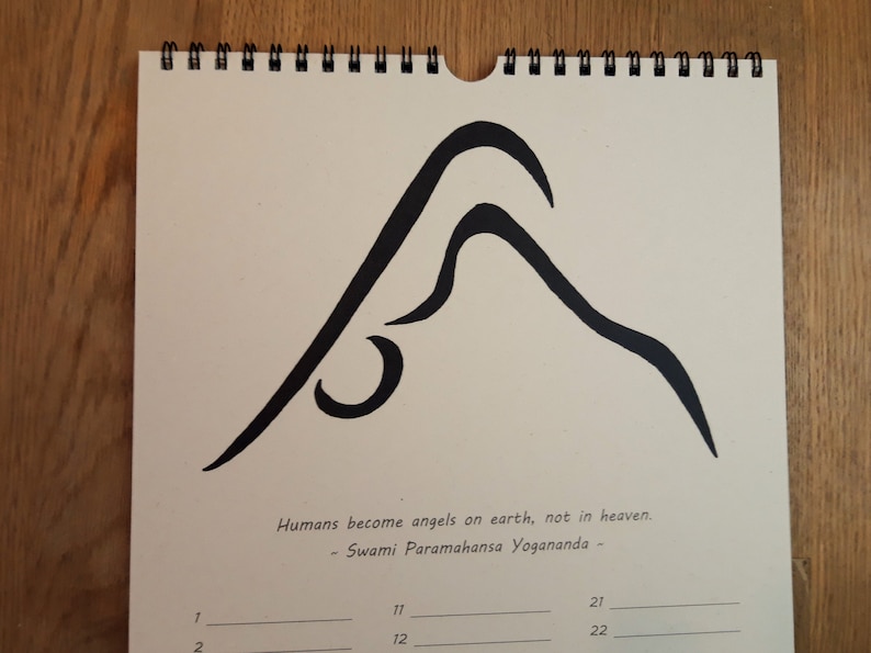 May include: A black and white illustration of a yoga pose on a beige calendar page. The quote "Humans become angels on earth, not in heaven. - Swami Paramahansa Yogananda -" is printed below the illustration.