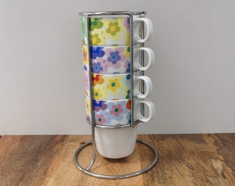 Set of 4 coffee mugs with retro floral border | Siaki Porcelain Amsterdam | Stackable in stainless steel holder | Various coffee cups with handles