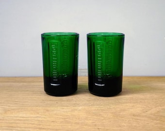 Set of 2 Vintage Jägermeister shot glasses | Robust, green pressed glass | Capacity 2 cl | 1980s