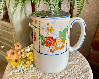 Vintage ceramic pitcher floral