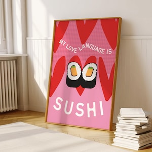 May include: Pink and red poster with a grid pattern and hearts. The poster says "My love language is sushi" and features two sushi rolls with a carrot inside.