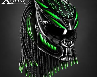 May include: A black motorcycle helmet with bright green accents and glowing green tribal-style markings on the top. The helmet features long black dreadlocks with green tips and a face mask design with the text XBow in the upper left corner.