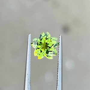 Top Quality Natural Peridot Cherry Blossom Cut (Special Custom cut) gemstones for jewellery size 7.50x7.20x4.88mm, Weight 1.65 Carats.