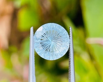 Natural Sky Blue Topaz Gemstone: Fantasy Cut Round, 3.75 Carats.