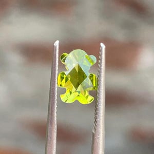 Top Quality Natural Peridot Teddy Cut (Special Custom cut) gemstones for jewellery, size 7.90x5.65x3.80mm, Weight 1.25 Carats.