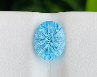 Natural Swiss Blue Topaz Gemstone: Fantasy Cut Oval, 1.90 Carats