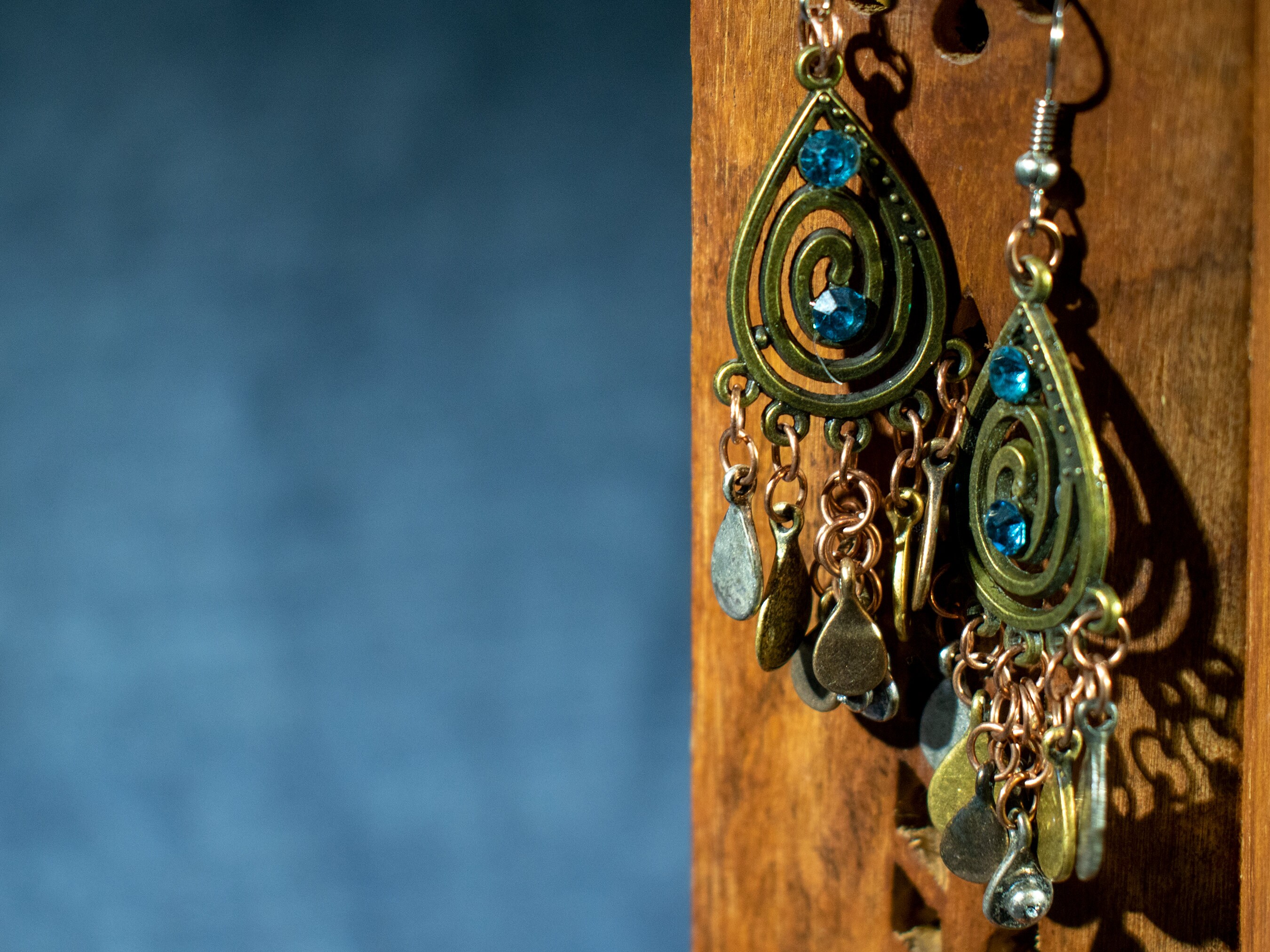 Antique Bronze Teardrop with teal crystals and silver, bronze, copper, and gold dangling teardrops - Item Number 5673