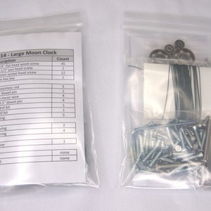 May include: A clear plastic bag containing a list of materials and their quantities needed to build a large moon clock. The list includes items like screws, dowel pins, drill bits, and fishing line. The bag also contains a separate clear plastic bag with the materials needed for the clock.
