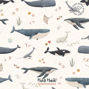 May include: A repeating pattern featuring various watercolor sea creatures, including whales, orcas, and stingrays, on a textured off-white background. The design includes starfish, seashells, and seaweed. The text "Marta Munte Pattern Design Studio" is at the bottom.