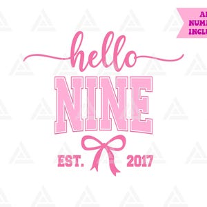 May include: A digital graphic design in shades of pink featuring the cursive text hello above the block-lettered text NINE. Below is a pink bow icon flanked by the text EST. and 2017. A pink banner in the top right corner reads ALL NUMBERS INCLUDED.