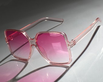 oversized pink glasses