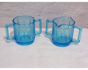 Azucarero y cremera vintage de doble asa con paneles Tiara Glass Blue Horizon.