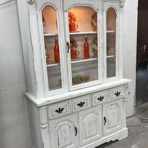Sold! Do not purchase!!! Shipping is included in the price! White Distressed 2 Piece Lighted China Cabinet. Farmhouse/Kitchen/Dining