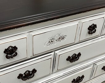 white dresser with black top Modus Paragon White 5-Drawer Dresser with Classic Black Knobs