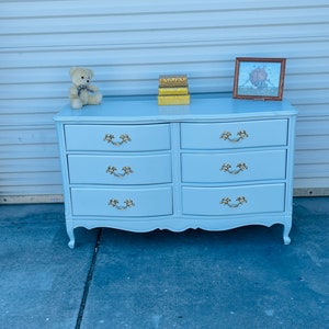 Sold! Do not purchase! Shipping is included in the price! Baby Blue French provincial Dresser with Gold hardware .