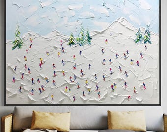 May include: A large rectangular wall art piece featuring a thick, textured oil painting of a snowy mountain landscape. The scene depicts numerous small figures skiing down a white slope dotted with green pine trees under a pale blue sky.