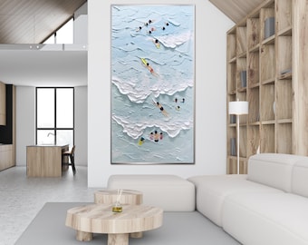 May include: A vertical rectangular wall art piece featuring a textured impasto oil painting of a light blue ocean with white crashing waves. Small figures of people are depicted swimming and surfing in the water, rendered in various colors.