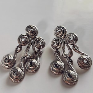 Vintage silver dangling pierced earrings