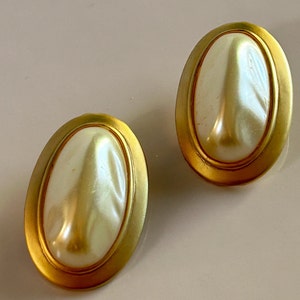 Vintage gold and white oval clip on earrings