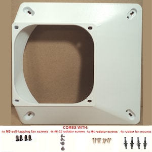 May include: A white, square-shaped computer fan housing with a large, rounded opening. The housing has several screw holes and is accompanied by various screws and fan mounts. The text "COMES WITH:" is visible.