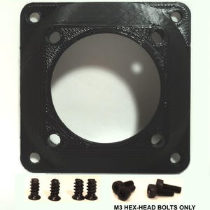 May include: A black, square-shaped component with a large central circular opening and smaller holes at each corner. The component is accompanied by several black screws and the text "M3 HEX-HEAD BOLTS ONLY INCLUDED WITH 2MM CLEARANCE HEIGHT OPTION."