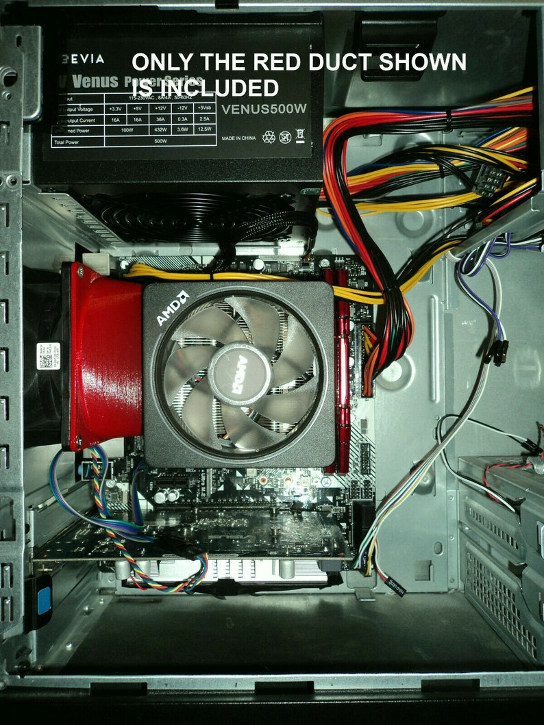 May include: Inside view of a computer case with a red duct, a black power supply unit with the text "VENUS500W" and a motherboard with an AMD CPU cooler.