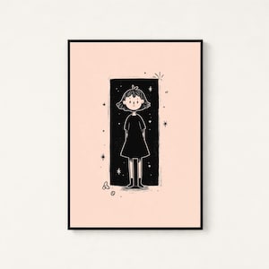 May include: A framed art print featuring a black and white line drawing of a person with short hair wearing a dress, centred within a black rectangular background on a pale pink field, surrounded by small star and circular doodle accents.