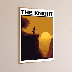 May include: A framed rectangular wall art print titled THE KNIGHT in black pixelated font. The illustration depicts a silhouette of a knight standing on a cliff edge with a sword, overlooking a golden sunset landscape with deep orange hues.
