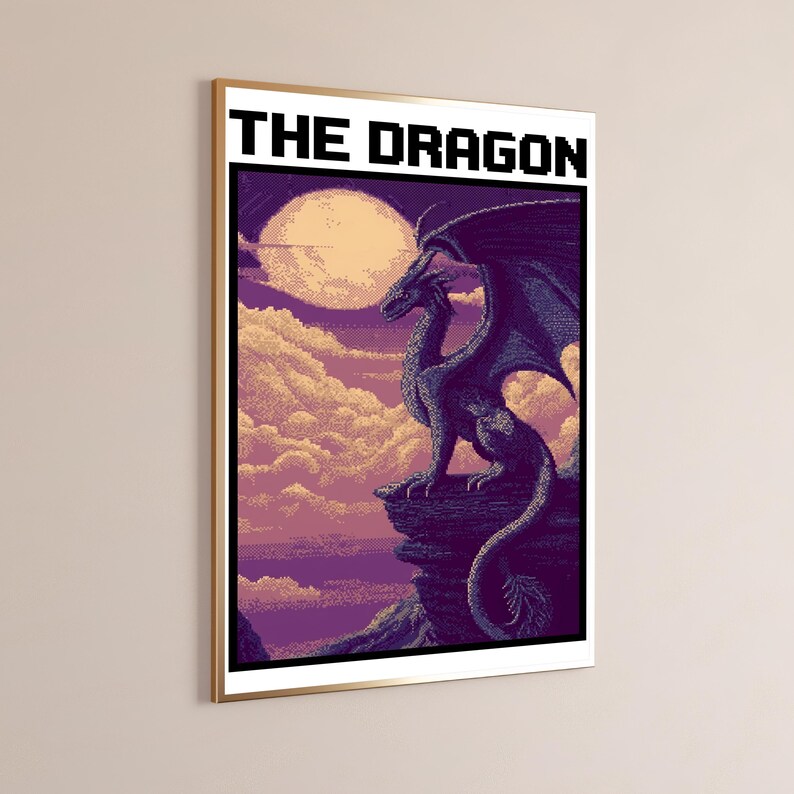 May include: A framed wall art print titled THE DRAGON in a bold black pixelated font. The artwork features a dark purple dragon perched on a rocky cliff edge against a backdrop of a large pale moon, soft clouds, and a deep purple sky.