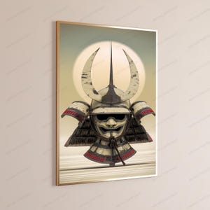 May include: A framed wall art print featuring a weathered, off-white samurai helmet with a prominent crescent-shaped crest and a fierce facial mask. The helmet displays dark, distressed detailing and red accents, set against a pale, circular background.