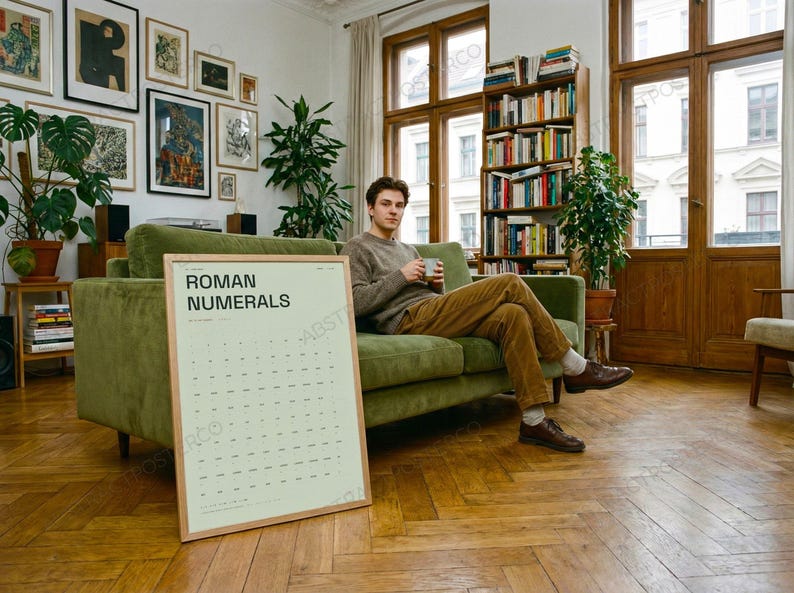 Learn Roman Numerals Chart Print in Sage shown in a living room