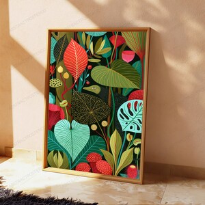 May include: A rectangular framed wall art print featuring a dense botanical illustration with a black background. The artwork displays various stylized leaves in shades of red, teal, light blue, and green, interspersed with small yellow berries and red textured circular forms.