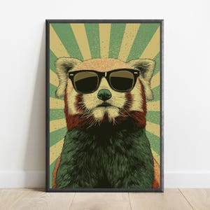 May include: A framed wall art print featuring a stylized illustration of a red panda wearing black sunglasses. The background consists of a sunburst pattern in alternating shades of muted green and beige, with a textured, vintage-inspired finish.