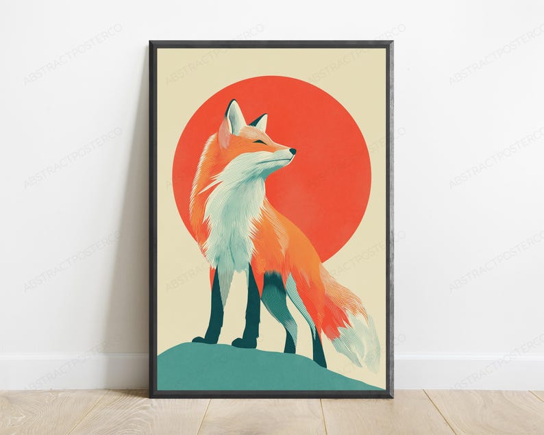 May include: A framed vertical wall art print featuring a stylised orange and white fox standing on a teal hill. Behind the fox is a large, solid red circle set against a cream-coloured background. The fox is looking towards the right side.