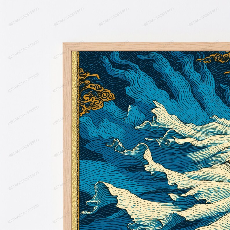 May include: A framed wall art print featuring a stylized graphic illustration of deep blue swirling waves and white foam crests, accented with golden cloud-like shapes, all enclosed within a light-toned wooden frame with a thin gold inner border.