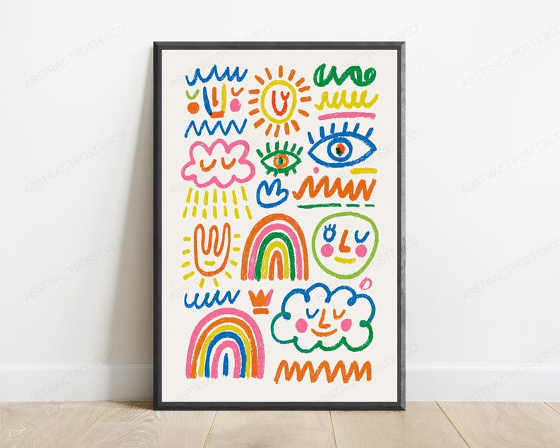 May include: A framed wall art print featuring a collection of colourful hand-drawn doodles on a cream background. The illustrations include a sun, rainbows, clouds with faces, eyes, and various wavy lines in vibrant shades of blue, pink, orange, and green.