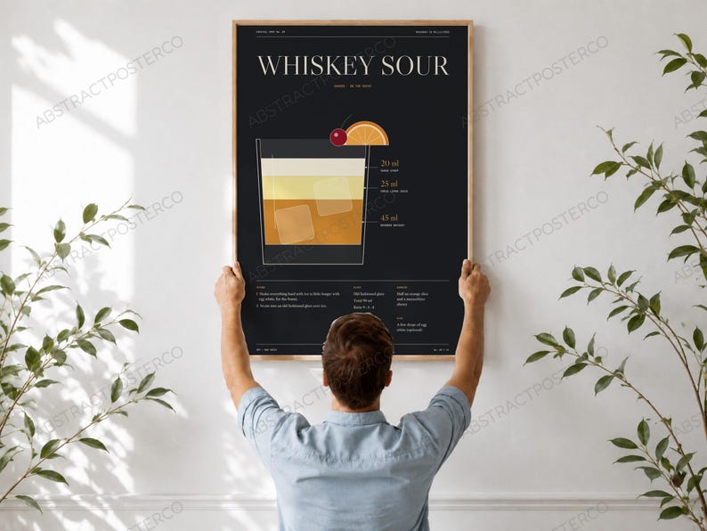 Whiskey Sour Cocktail Recipe Print, held up in a room