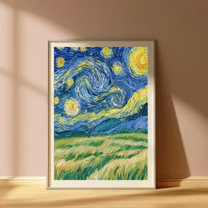 May include: A framed art print featuring a swirling night sky with bright yellow stars and a crescent moon above rolling blue hills. A small dark tree stands in the foreground over a field of textured green and yellow brushstrokes.