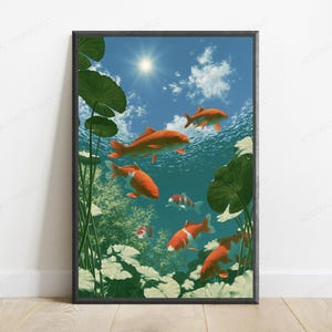 May include: A framed vertical wall art print depicting a vibrant underwater scene with multiple orange and white koi fish swimming among green lily pads and aquatic plants, beneath a bright blue sky with a visible sun and scattered white clouds.