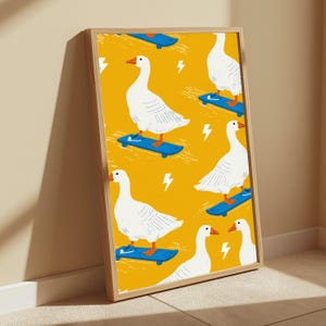 May include: A framed vertical art print featuring a repeating pattern of white geese on skateboards against a vibrant mustard yellow background. The geese are wearing blue sneakers, and the design includes small white lightning bolt icons throughout.